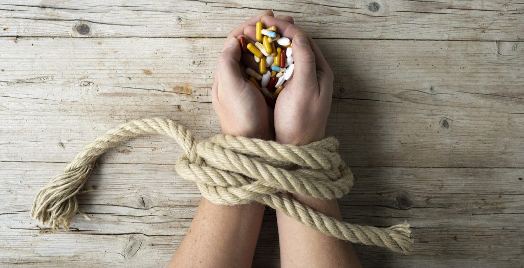 Illustration of the social consequences of addiction on individuals, families, and communities.