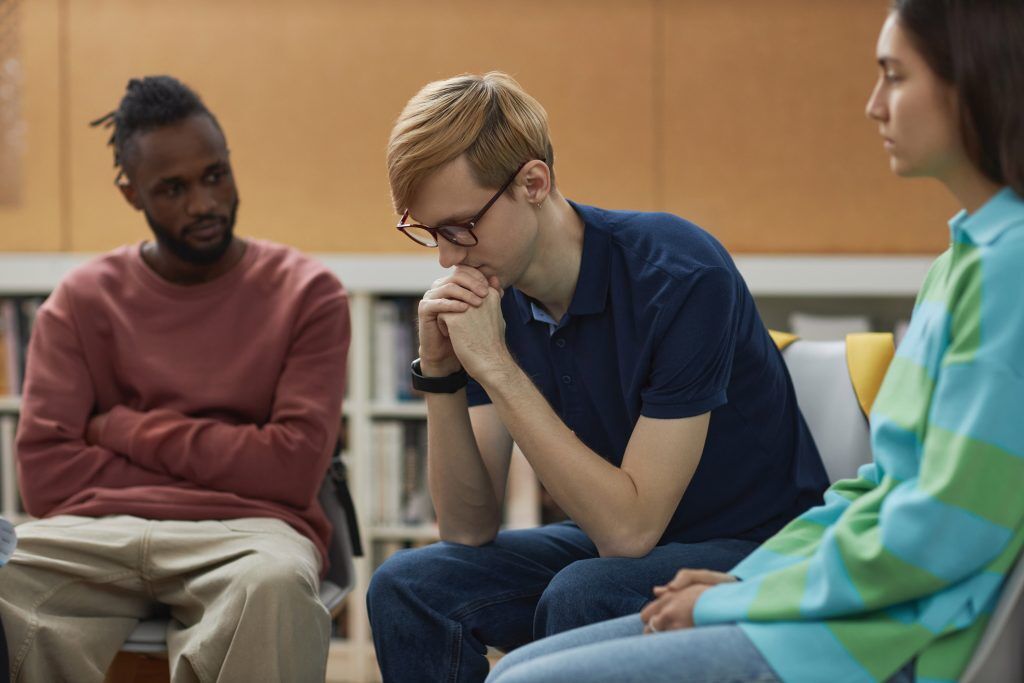 Top Group Ideas for Substance Abuse Treatment & Recovery 1 Illustration of group therapy for substance abuse, showing individuals participating in a supportive environment for recovery.