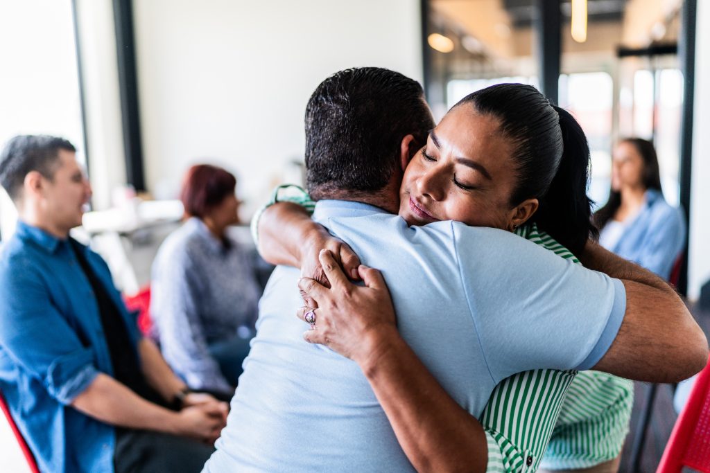 A family gathering in a supportive environment to conduct an intervention