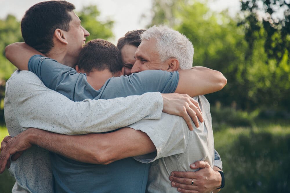 A family supporting a loved one during addiction recovery, emphasizing the importance of family involvement in the rehab process.