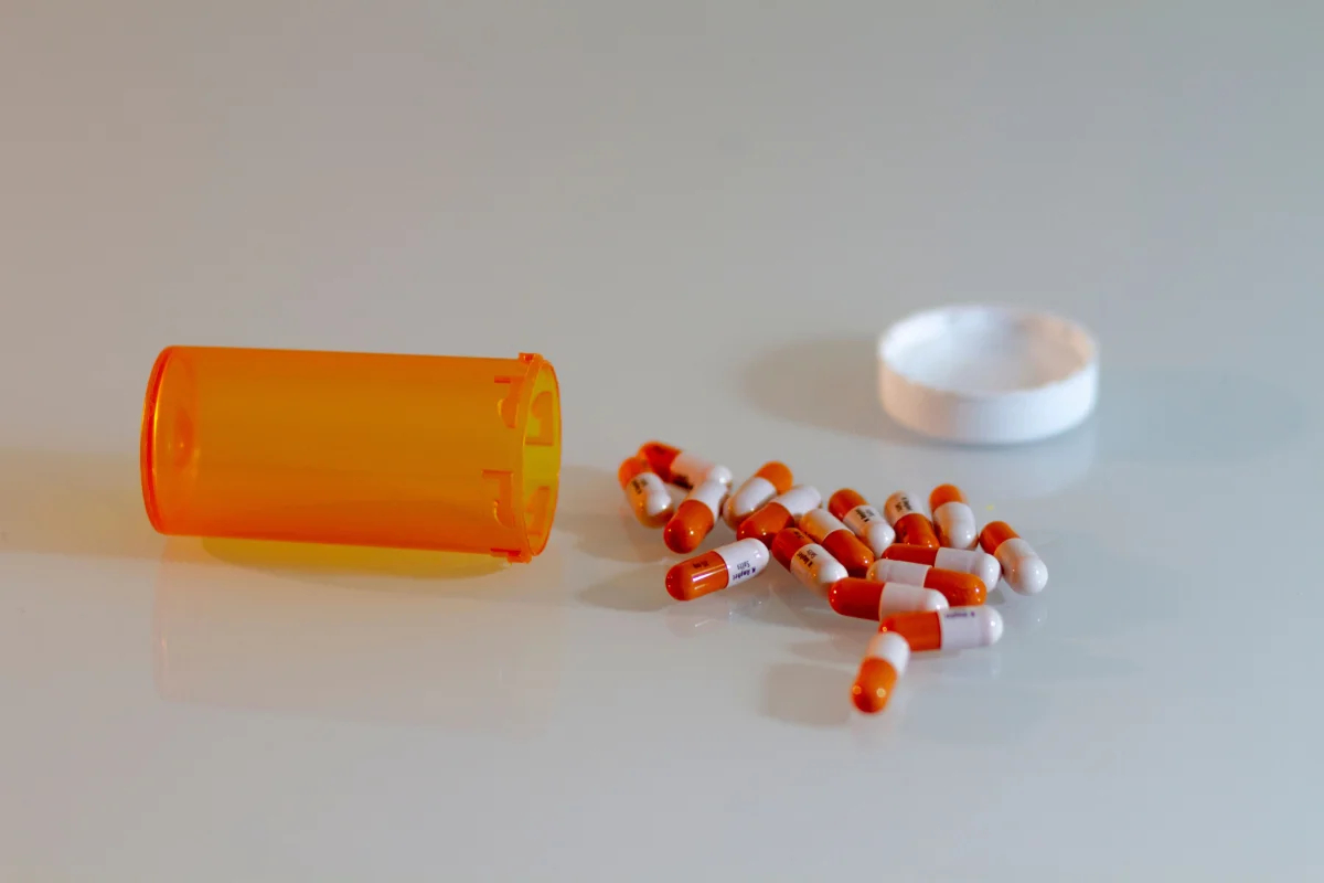 Image showing lorazepam medication bottle with warning label on addiction risks.