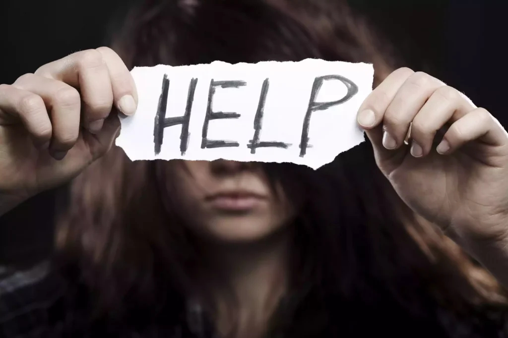 A person seeking help for drug addiction through a support group and professional treatment.