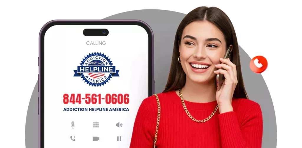 An image of a phone displaying Minnesota substance abuse helpline numbers for support.